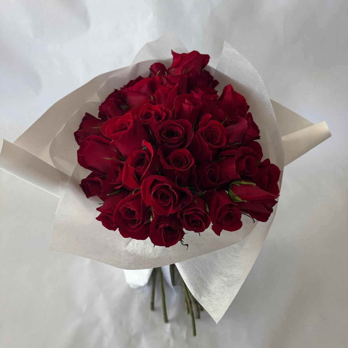A bouquet of red roses in your chosen size.
