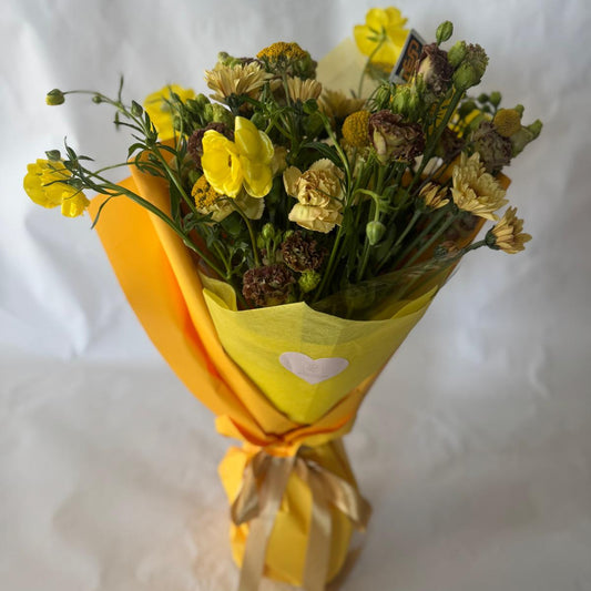 Signature floral bouquet inspired by the Padres, featuring rich brown, gold, and cream blooms. Wrapped in Korean paper with a silk ribbon and matching team sticker.
